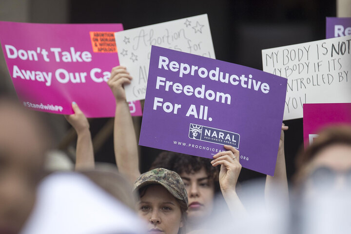 Protesters rally outside of the Georgia State Capitol following the signing of Georgia's bill restricting abortions on May 7,