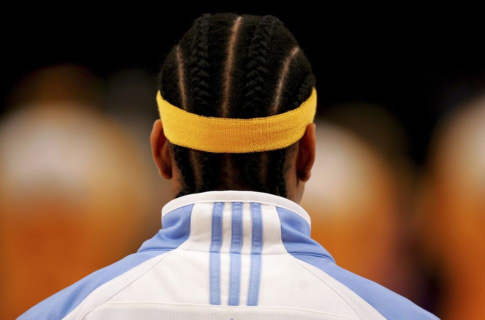 Iverson of the Denver Nuggets stands for the national anthem before a game with the Los Angeles Lakers on Jan. 5, 2007.