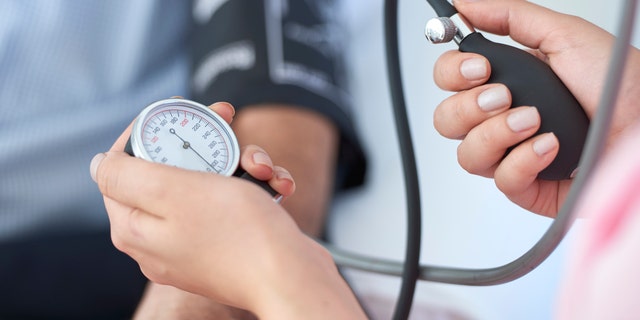 A nurse measures a patient's blood pressure. "A patient is at risk for high blood pressure, also known as hypertension, if the systolic blood pressure readings are consistently 120-129, which is termed elevated blood pressure," said one health professional.