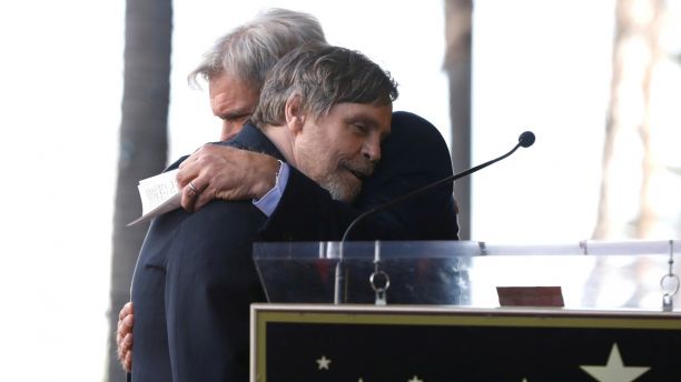 Actor Harrison Ford embraces actor Mark Hamill (L) before unveiling his star on the Hollywood Walk of Fame in Los Angeles, California, U.S., March 8, 2018. REUTERS/Mario Anzuoni - RC1F33827320