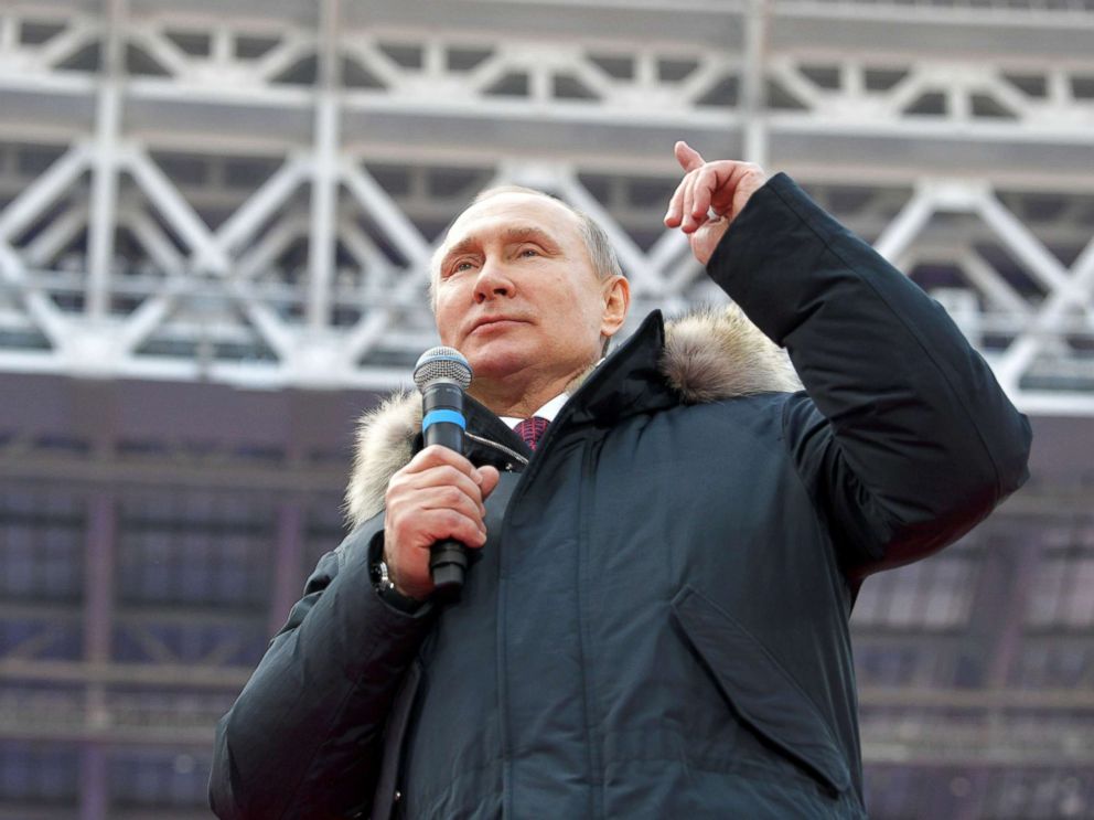 PHOTO: Russian President Vladimir Putin delivers a speech during a rally to support his bid in the upcoming presidential election, at Luzhniki Stadium in Moscow, March 3, 2018.