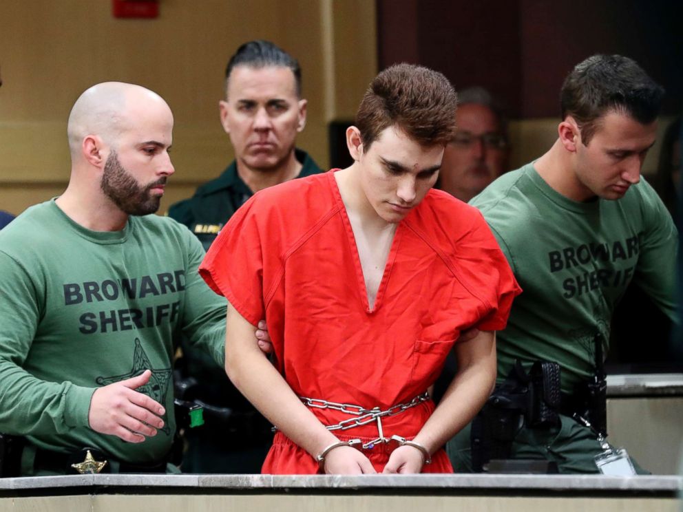 PHOTO: Nikolas Cruz is lead into the courtroom before being arraigned at the Broward County Courthouse in Fort Lauderdale, Fla., March 14, 2018.