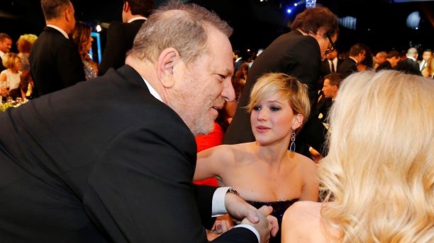 Producer Harvey Weinstein speaks with Jennifer Lawrence (C) during a commercial break at the 20th annual Screen Actors Guild Awards in Los Angeles, California January 18, 2014   REUTERS/Mike Blake  (UNITED STATES  Tags: ENTERTAINMENT)(SAGAWARDS-SHOW) - TB3EA1J07IQ42
