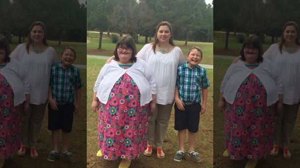 Anna Hankins with her mum Jennifer and brother Jack. See SWNS story NYHUNGER; A 15-year-old girl who weighs 380lbs due to a rare condition which makes her so hungry she rifles through BINS in search of grub has been crowned a pageant queen. Anna Hankins has Prader-Willi Syndrome, an incurable genetic disorder which causes low muscle tone, short stature and chronic eating. The ninth grader was born prematurely and underweight, but as a toddler developed an insatiable appetite and was diagnosed with the condition aged two. She would pinch food from her parents' plates, could eat a whole pack of cookies in one go and even rifled through the trash in search of grub. It became so extreme that her parents started locking the FRIDGE and closets to stop Anna raiding them. The teenager, of Louisville, Mississippi, is now on a 900 calorie-a-day diet but because her body does not break down food properly, she cannot lose weight. She needs oxygen to help her breathe and is unable to dress herself of tie her shoelaces because of her size. Her mum, bank branch manager Jennifer Hankins, 37, said strangers stare and kids ask why she is 'fat'. Despite her health issues, the brave teenager loves being center stage and was recently crowned queen in a pageant celebrating women and girls with disabilities. Precious photos show Anna grinning as she is crowned Mississippi winner, and she is set to represent her state in the national Miss Amazing content in Chicago in August. 