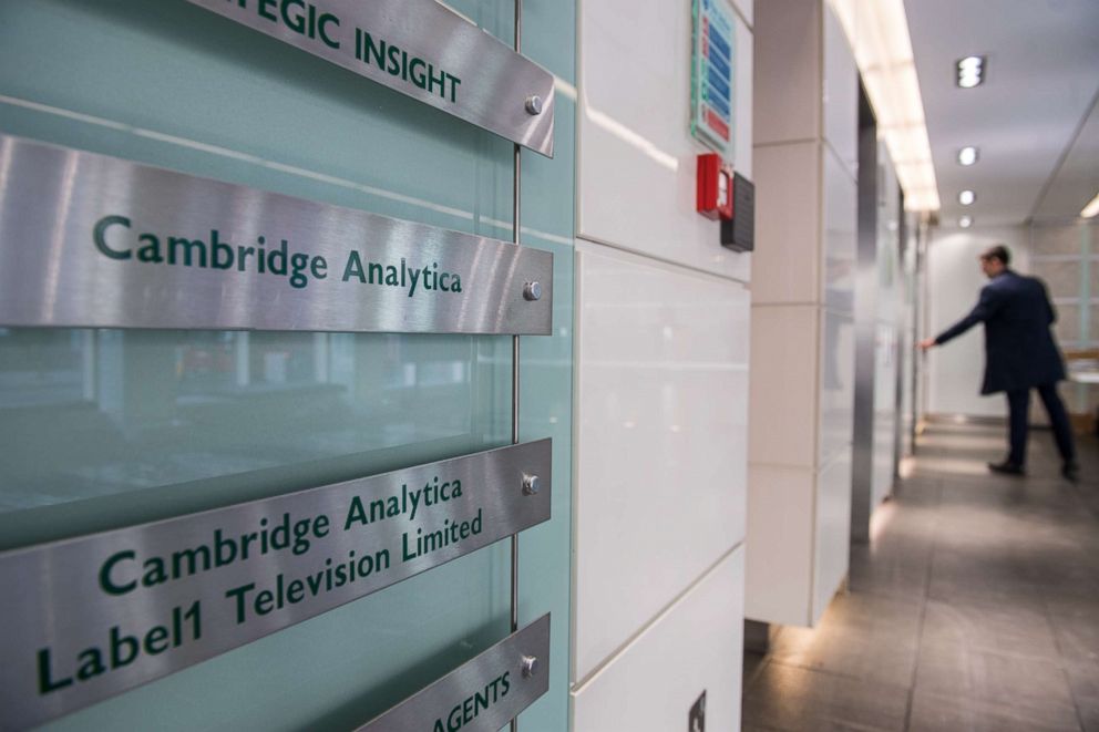 PHOTO: Signs for the company Cambridge Analytica in the lobby of the building in which they are based in London, England, on March 21, 2018. 