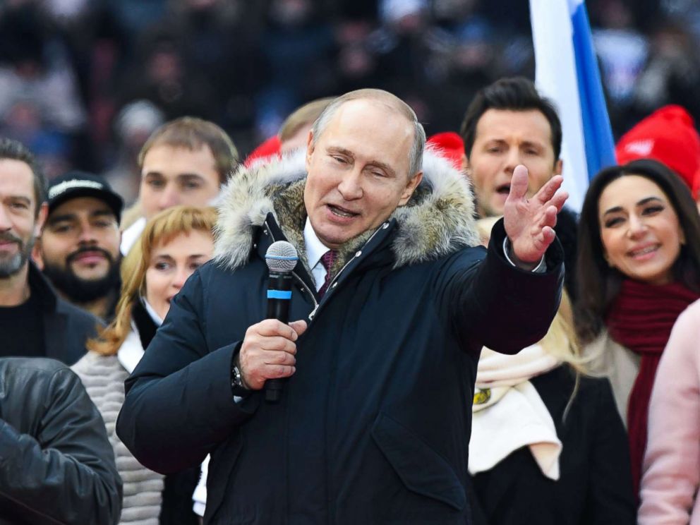 PHOTO: Russian President Vladimir Putin gives a speech during a rally in his support as a presidential candidate at the Luzhniki stadium in Moscow, March 3, 2018.