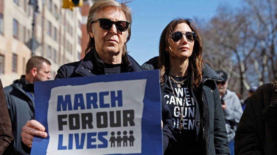 Former Beatle Sir Paul McCartney joins the rally during a "March For Our Lives" demonstration demanding gun control in New York City. March 24, 2018.
