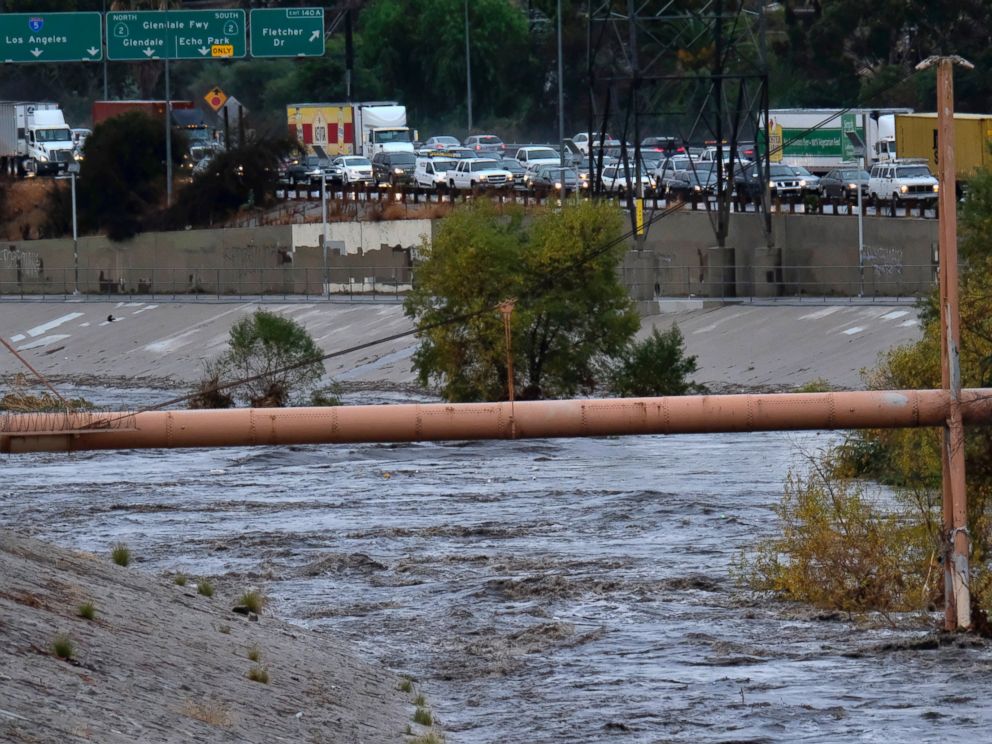 A file photo from Dec. 9, 2017 shows traffic at a standstill on the Interstate 5 freeway next to the Los Angeles River near downtown Los Angeles.