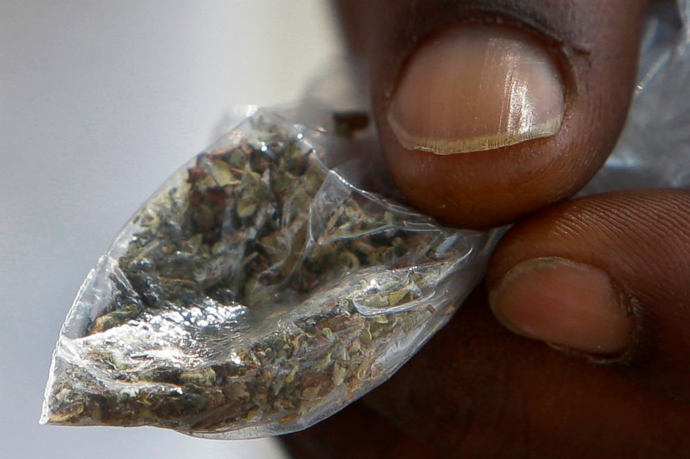 PHOTO: A man holds a bag of synthetic marijuana in Houston, in this June 29, 2016 file photo.