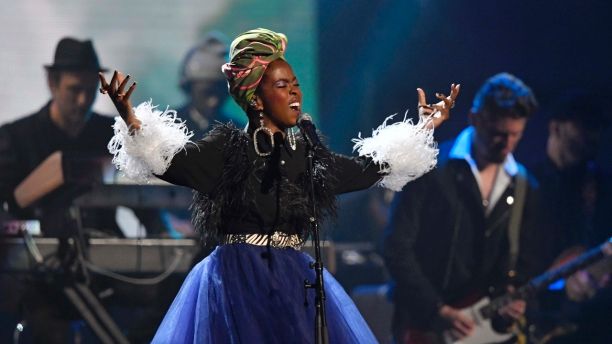 Recording artist Lauryn Hill pays tribute to Nina Simone during the Rock and Roll Hall of Fame induction ceremony, Saturday, April 14, 2018, in Cleveland. (AP Photo/David Richard)