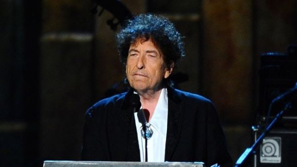 FILE - In this Feb. 6, 2015 file photo, Bob Dylan accepts the 2015 MusiCares Person of the Year award at the 2015 MusiCares Person of the Year show in Los Angeles. Dylan, the winner of this years Nobel Prize in literature declined the invitation to the Dec. 10 2016 prize ceremony and banquet, pleading other commitments. But the Nobel Foundation said Monday that Dylan has written a speech of thanks that will be read by a yet-to-be-decided person at the lavish banquet in Stockholms City Hall. (Photo by Vince Bucci/Invision/AP, File)