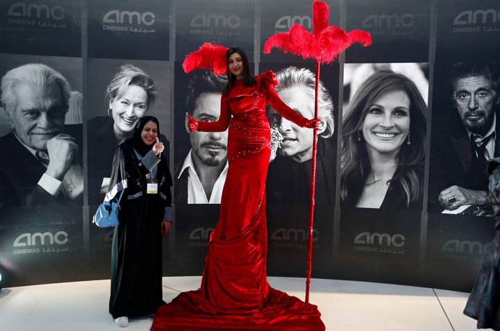 A woman poses at Saudi Arabia's&nbsp;first new commercial movie theater in Riyadh on April 18, 2018.