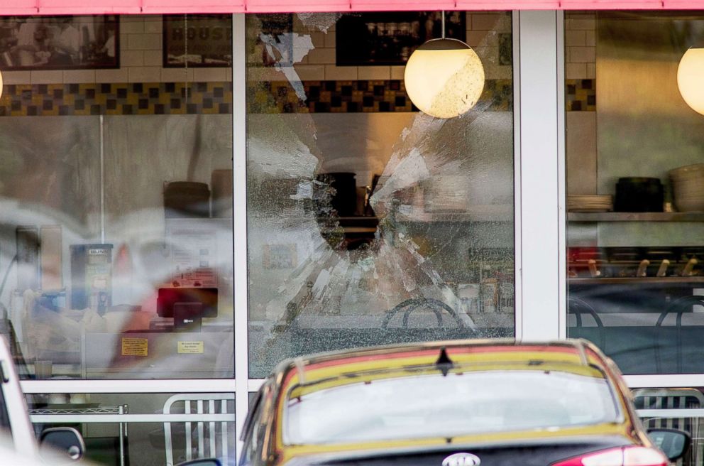 PHOTO: A shattered window at the scene of a shooting at a Waffle House Restaurant near Nashville, Tenn., April 22, 2018.
