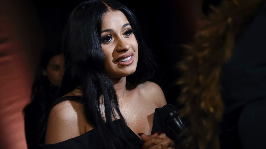 Rapper Cardi B attends the Warner Music Group pre-Grammy party at The Grill/The Pool on Thursday, Jan. 25, 2018, in New York. (Photo by Evan Agostini/Invision/AP)