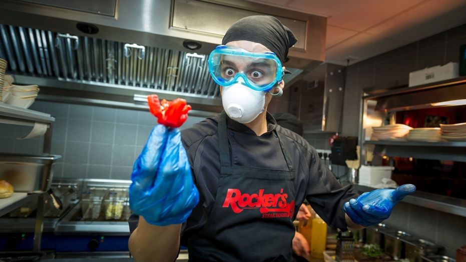 Chef Rodrigo Recio with a "Carolina Reaper" chili after an unidentified man in New York was left with thunderclap headaches from eating the famous pepper.