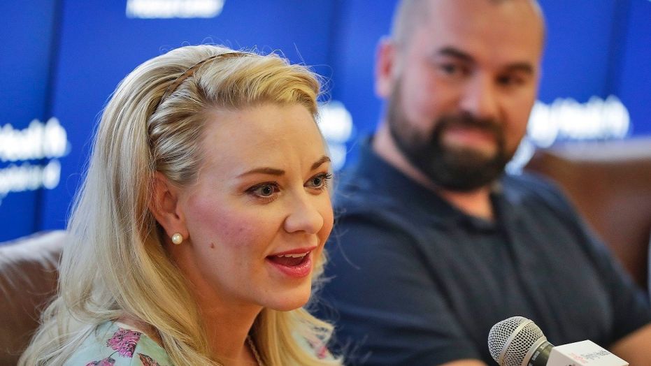 Jamie Scott speaks accompanied by her husband, Skyler, during a news conference at St. Joseph’s Hospital and Medical Center in Phoenix on Friday, April 6, 2018. Jamie gave birth to quintuplets on March 21, 2018.