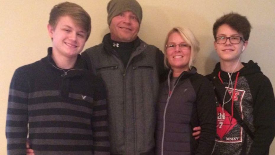 Connie Christy, pictured with her husband and two teen sons, has an extremely rare condition that causes her to emit a strong odor after eating certain foods.