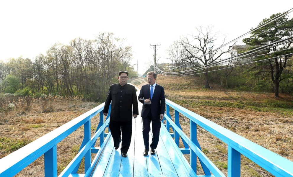 PHOTO: North Korean leader Kim Jong-Un talks with South Korean President Moon Jae-In at the Peace House on Joint Security Area (JSA) on the Demilitarized Zone (DMZ) in the border village of Panmunjom in Paju, South Korea, April 27, 2018.