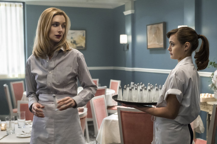 Caitlin FitzGerald as Simone&nbsp;teaches Tess the&nbsp;finer side of restaurant work.