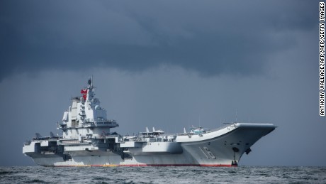 China&#39;s sole aircraft carrier, the Liaoning, arrives in Hong Kong waters on July 7, 2017.