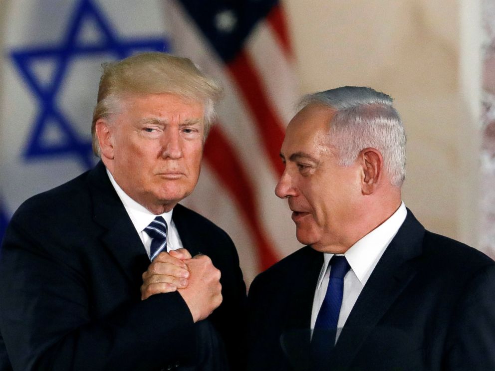 PHOTO: President Donald Trump and Israeli Prime Minister Benjamin Netanyahu make a gesture of solidarity after Trumps address at the Israel Museum in Jerusalem, May 23, 2017. 