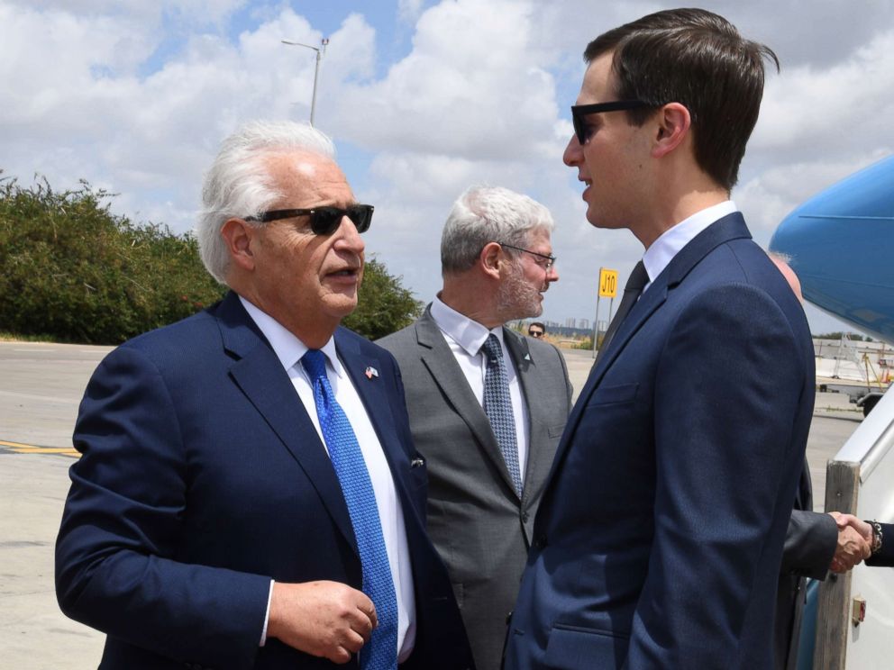 PHOTO: A handout photo made available by the US embassy in Tel Aviv shows US Ambassador to Israel David Friedman, left welcoming Jared Kushner upon arrival near Lod, Israel, May 13, 2018.