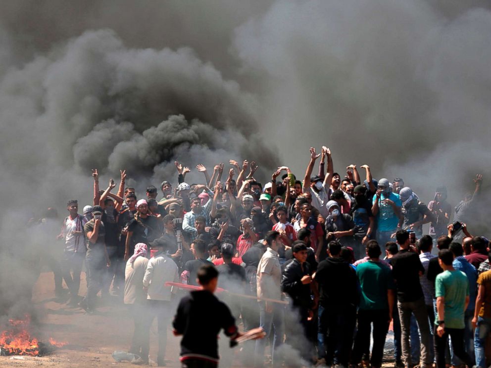 PHOTO: Palestinian demonstrators near the Gaza-Israel border, east of Gaza City, as Palestinians readied for protests over the inauguration of the US embassy following its controversial move to Jerusalem, May 14, 0218.