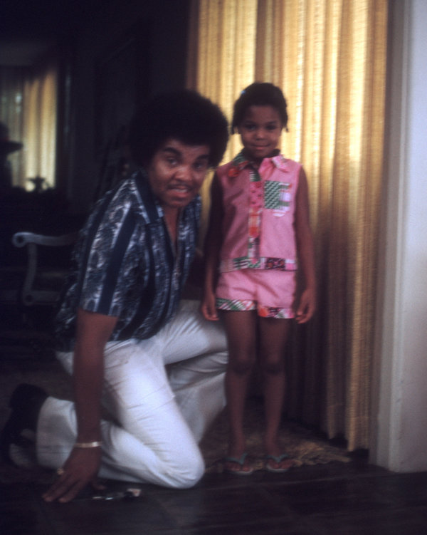 Posing&nbsp;for a portrait with her father, Joe Jackson, in Los Angeles.