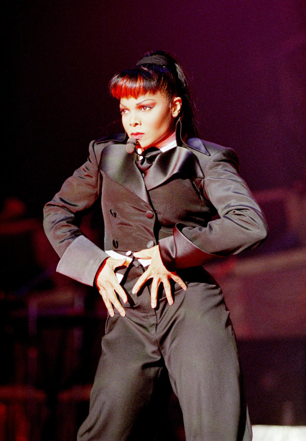 Performing onstage during The Velvet Rope tour.