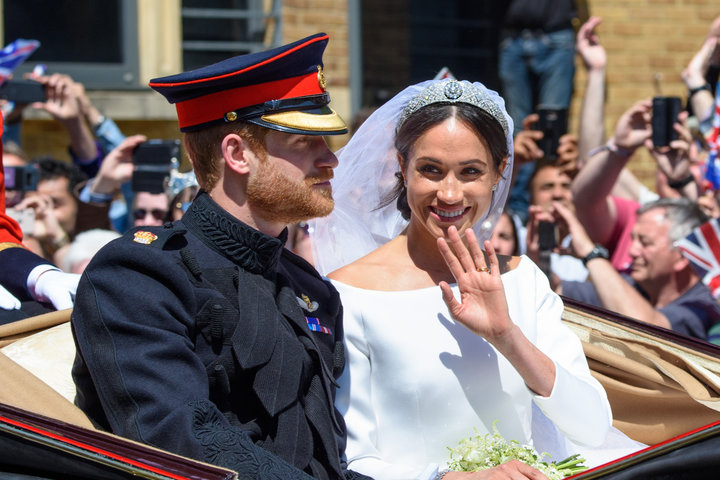 Prince Harry and Meghan Markle, the new Duke and Duchess of Sussex, pictured during their carriage procession through Windsor