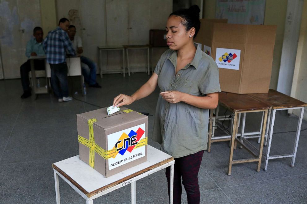 PHOTO: A Venezuelan casts her vote at a polling station during the presidential election in Caracas, Venezuela, May 20, 2018.