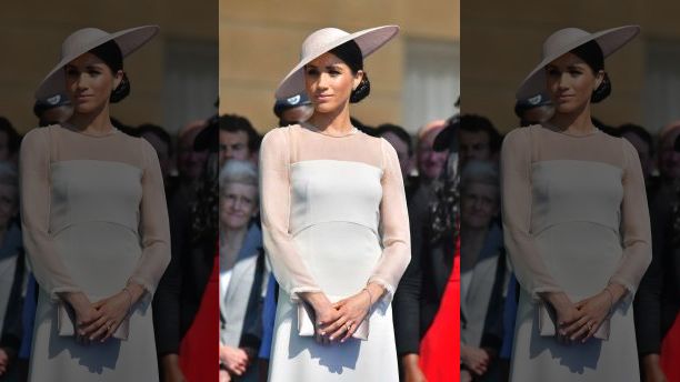 Meghan, the Duchess of Sussex attends a garden party at Buckingham Palace in London, Tuesday May 22, 2018, her first royal engagement since her wedding to Prince Harry on Saturday. The event is part of the celebrations to mark the 70th birthday of Prince Charles.  (Dominic Lipinski/Pool Photo via AP)