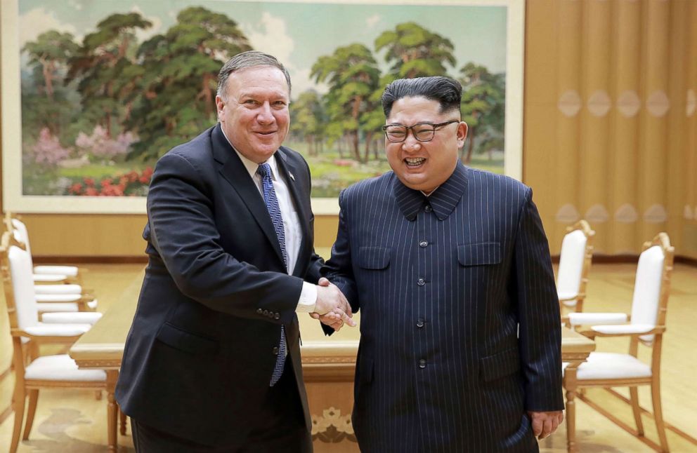PHOTO: North Korean leader Kim Jong Un and US Secretary of State Mike Pompeo shaking hands at the Workers Party of Korea headquarters in Pyongyang, North Korea, May 8, 2018.