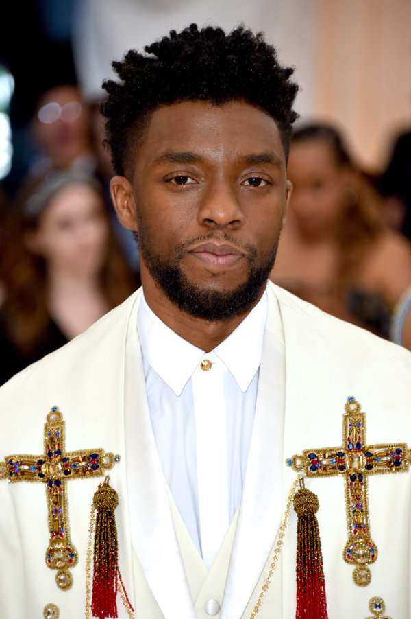 Chadwick Boseman's hair at the 2018 Met Gala featured plenty of volume on top with an expert fade on the sides.