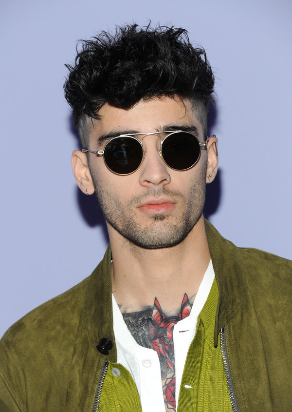 Zayn Malik's recent hairstyle is business on the sides, party on top.&nbsp;