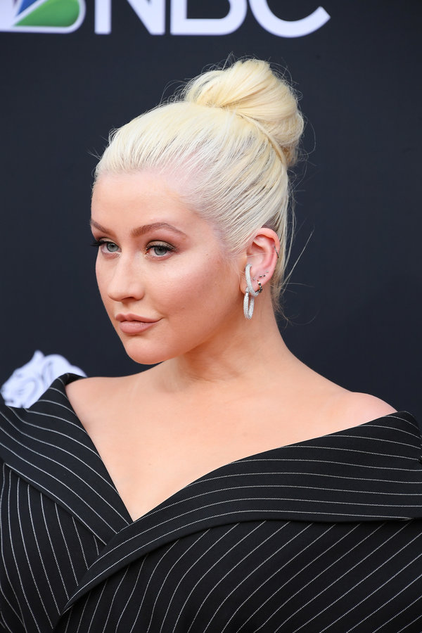 The classic ballerina bun, as seen on Christina Aguilera, is pretty much a perfect style for any occasion.