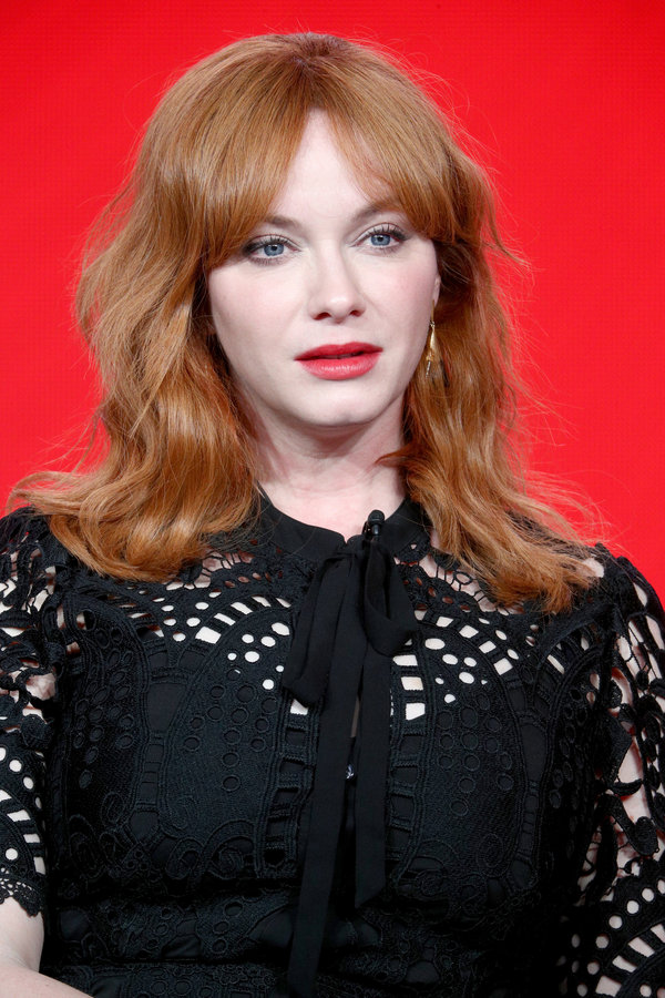 Christina Hendricks' tousled 'do with "curtain bangs" is&nbsp;great for the '70s-obsessed folks out there. It's got vintage v