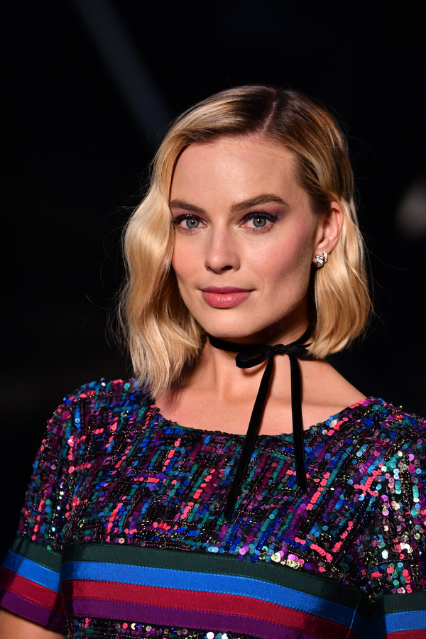Margot Robbie's wavy bob is classic, but&nbsp;the asymmetric cut with one side slight longer than the other&nbsp;adds a moder