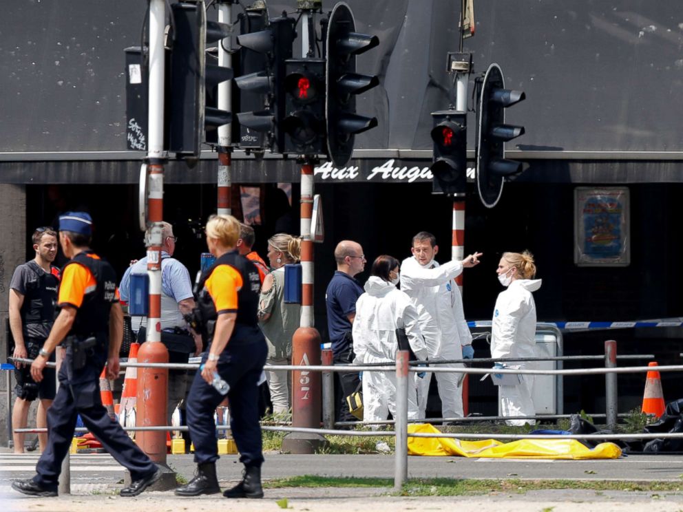 PHOTO: Forensics experts are seen on the scene of a shooting in Liege, Belgium, May 29, 2018.