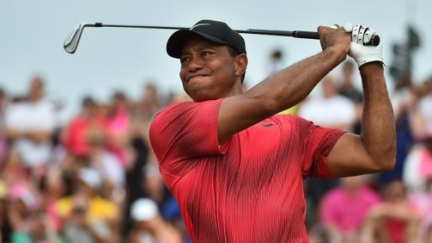 May 13, 2018; Ponte Vedra Beach, FL, USA; Tiger Woods plays his shot from the 18th tee during the final round of The Players Championship golf tournament at TPC Sawgrass - Stadium Course. Mandatory Credit: Jasen Vinlove-USA TODAY Sports - 10834541