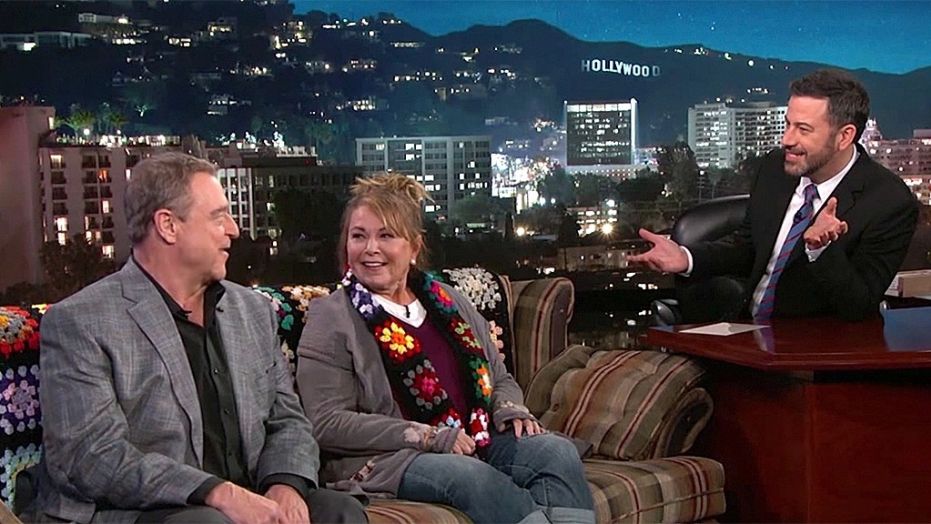 Jimmy Kimmel addresses the "Roseanne" cancellation on his Tuesday night show with a possible spin off solution. Here, Kimmel interviews Roseanne Barr and John Goodman back in March, before the shows reboot premiere.