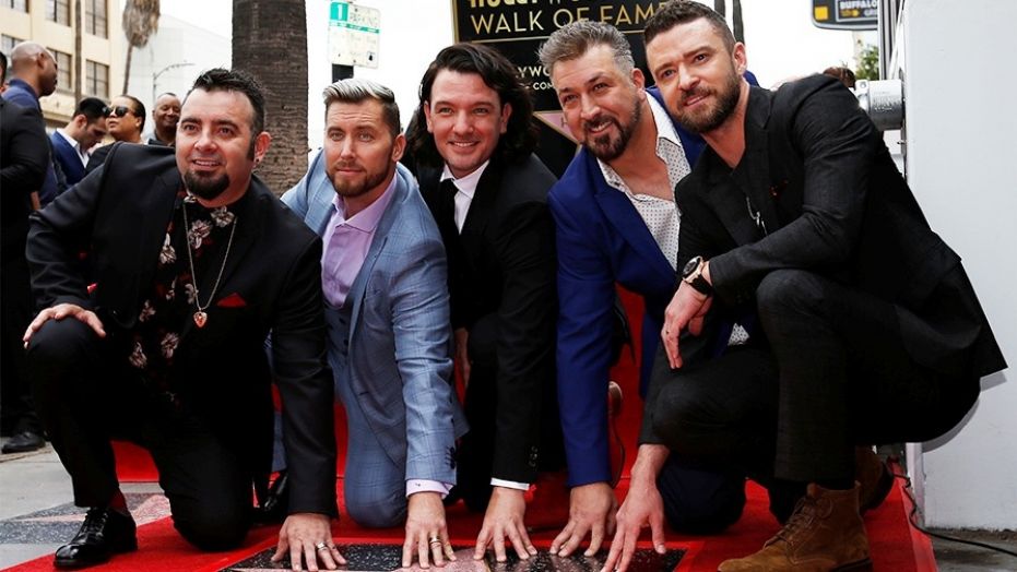 Justin Timberlake (right), who recently received a star on Hollywood's Walk of Fame alongside his *NSYNC bandmates, admitted he onced hooked up with a Spice Girl.