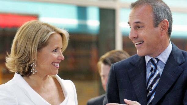 Katie Couric (L) stands with her co-host Matt Lauer in the outside portion of the "Today" set in New York's Rockefeller Plaza, May 31, 2006.