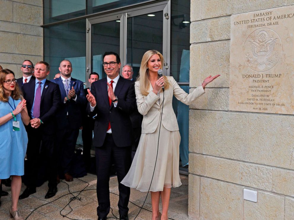 PHOTO: From left, Treasury Secretary Steve Mnuchin claps as White House senior advisor and President Trumps daughter Ivanka Trump unveils an inauguration plaque during the opening of the U.S. embassy in Jerusalem, May 14, 2018.