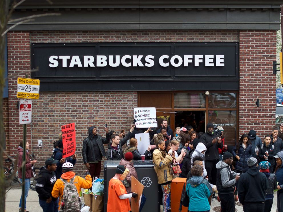 PHOTO: Protesters demonstrate outside a Center City Starbucks, April 15, 2018 in Philadelphia.
