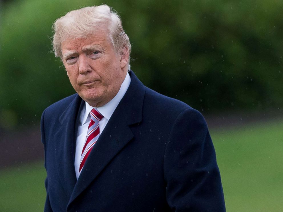 PHOTO: President Donald Trump walks to Marine One prior to departure from the South Lawn of the White House in Washington, D.C., April 16, 2018, as he heads for Florida.