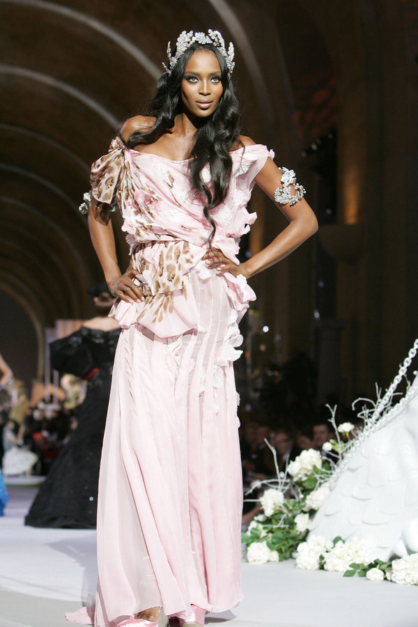 On the catwalk wearing Dior Haute Couture in Versailles, France.