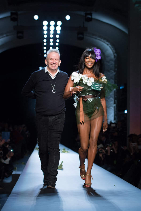 With fashion designer Jean Paul Gaultier at the end of his show as part of Paris Fashion Week.