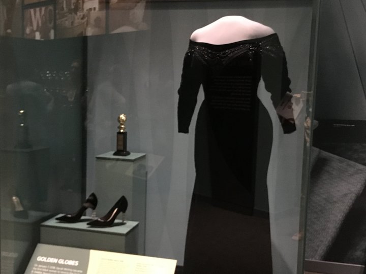 Oprah's dress and shoes, along with the Cecil B. DeMille Award, from the Golden Globes ceremony this January.