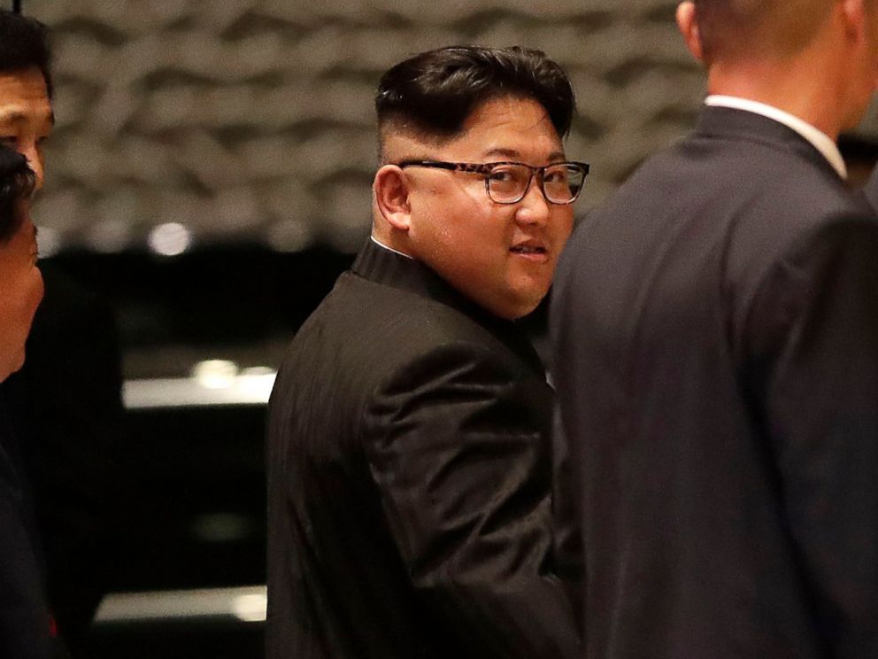 PHOTO: North Korean leader Kim Jong Un walks out from the Marina Bay Sands hotel during a city tour in Singapore, June 11, 2018.